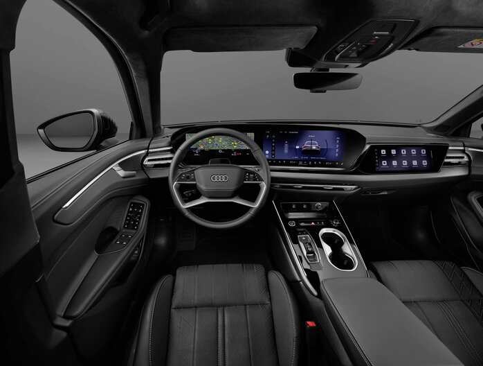 Breedbeeld interieur van de Audi A6 Allroad, voorzien van geavanceerde displays en een opgeruimde middenconsole.