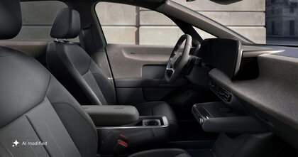 Het interieur van de nieuwe Audi A2 e-tron gezien door het raam van de passagier