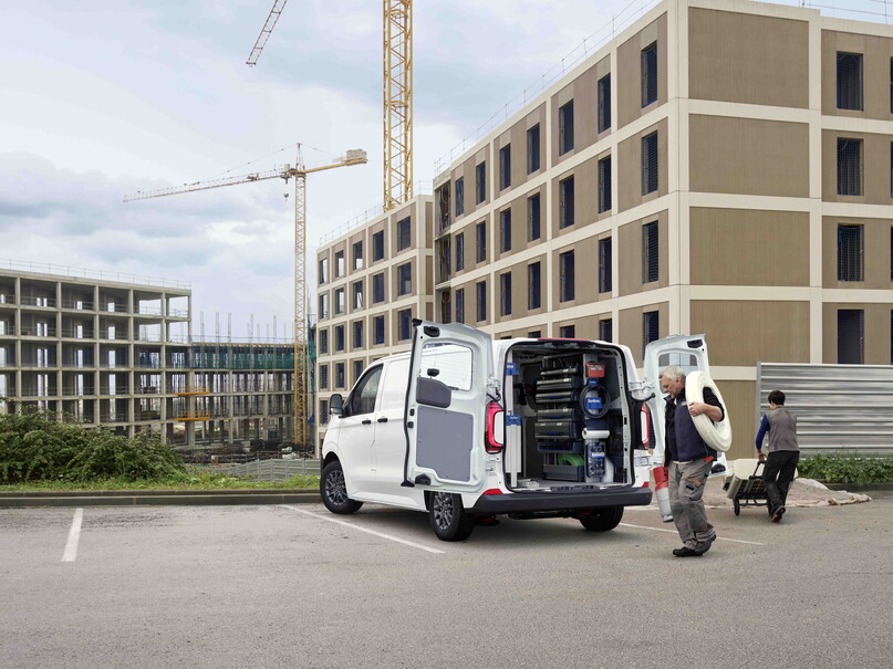 Volkswagen Transporter with customized cargo space with cast at construction site
