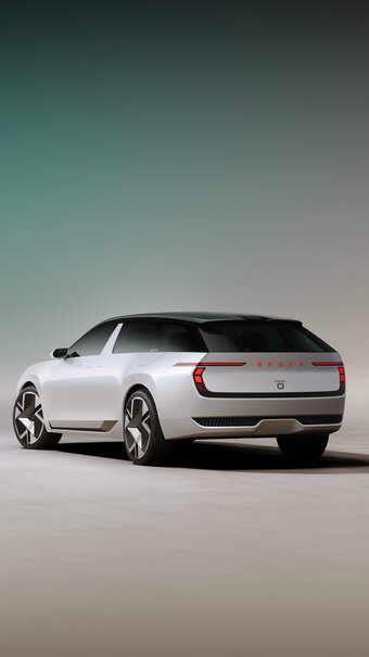 Witte Skoda Vision O conceptauto achterkant met opvallende rode achterlichten en futuristische velgen.