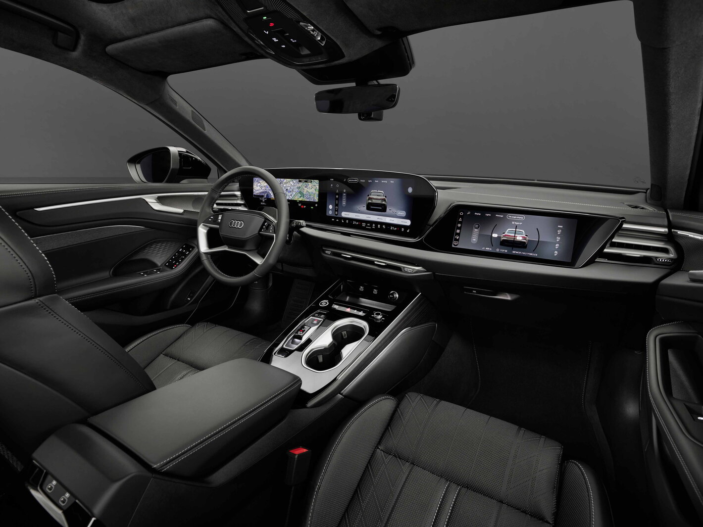 Luxe Audi A6 Allroad interieur met zwart leer, digitaal dashboard en multifunctioneel stuurwiel.