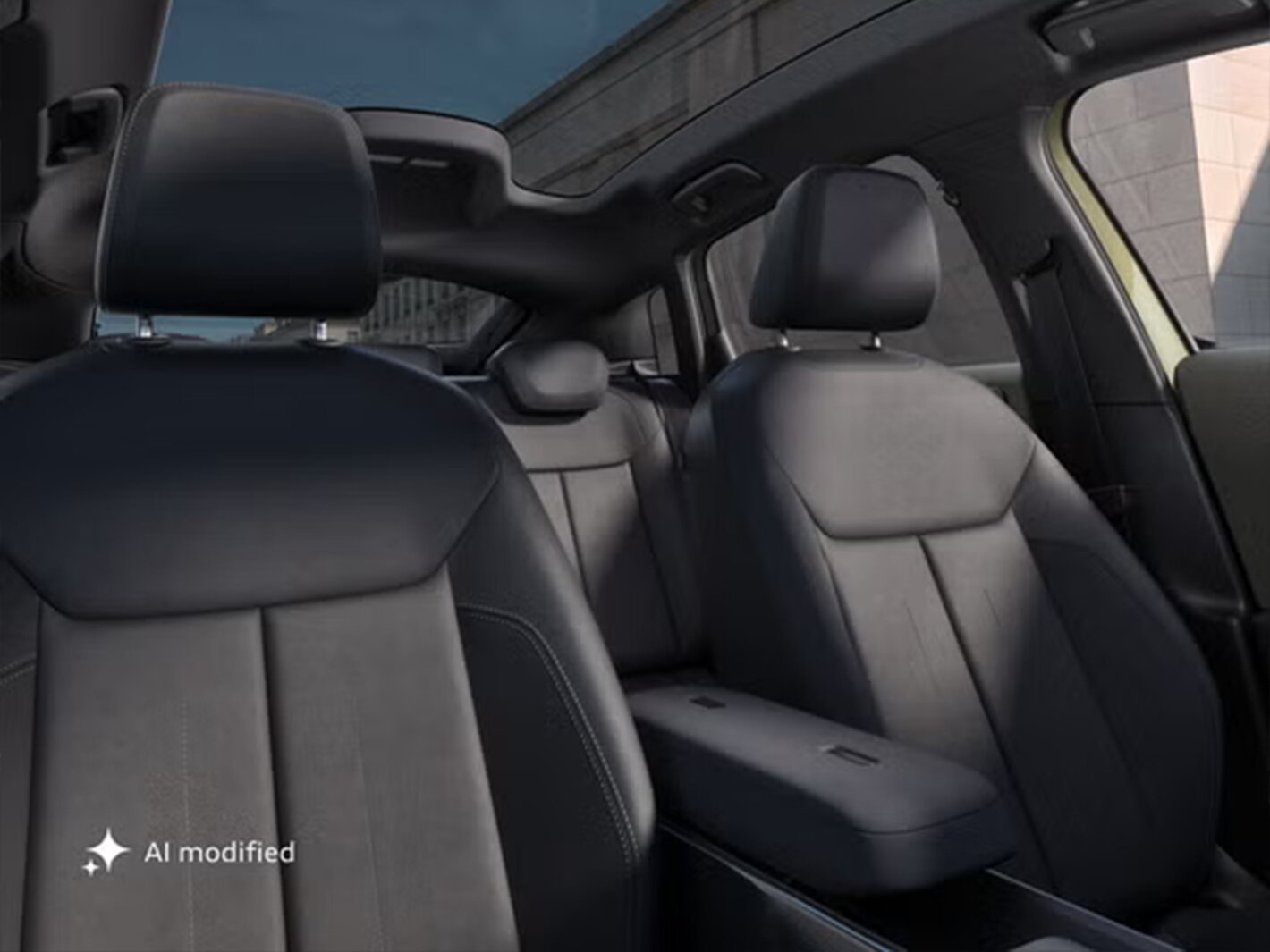 Het interieur van de nieuwe Audi A2 e-tron naar achter gezien met focus op het panoramisch dak